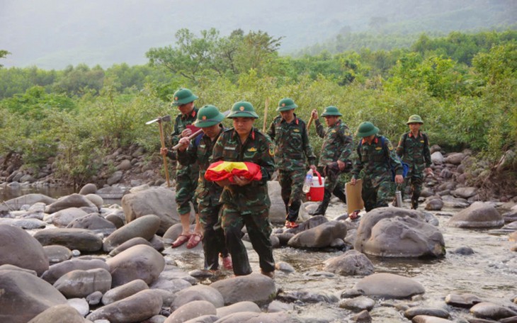 Đất mẹ đón 28 hài cốt liệt sĩ hy sinh tại chiến trường Lào trở về- Ảnh 4.
